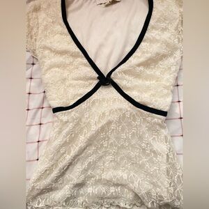 Elegant Cream Lace Blouse with Black Trim
